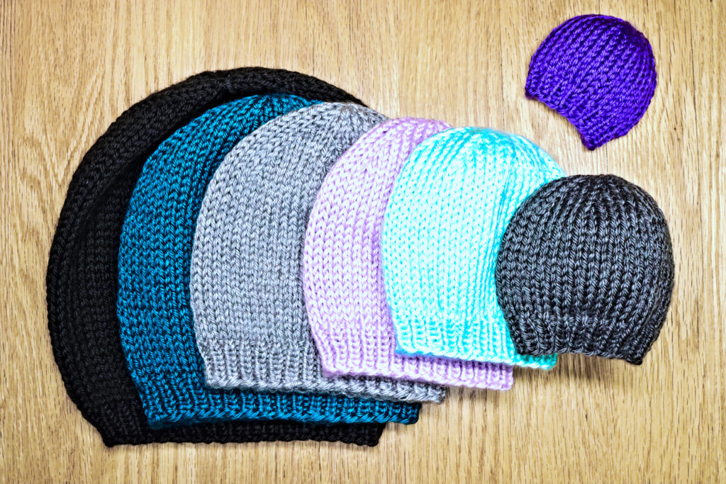 Beanie hats can be knit in all sizes. Learn how to measure heads so you can knit the correct sized hats in this guide from Liz Chandler @PurlsAndPixels.