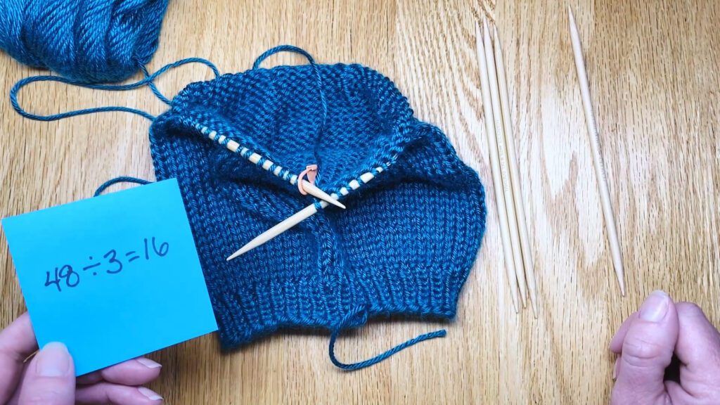 Step 1: Learn to switch from circular needles to double point needles (DPNs) by closing a bottom-up hat top in this knitting lesson with Liz Chandler @PurlsAndPixels.