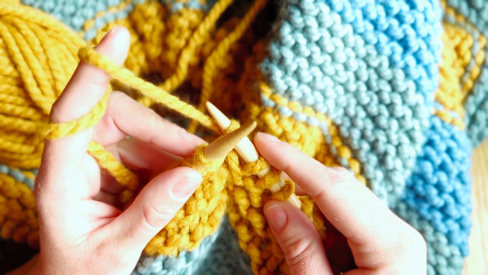 Continental knitting with the yarn held in the left hand while forming stitches on knitting needles.