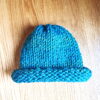 The most simple seamless knit hat is made with just knit stitches has a naturally rolling brim. Get the PDF knitting pattern from Liz Chandler @PurlsAndPixels.