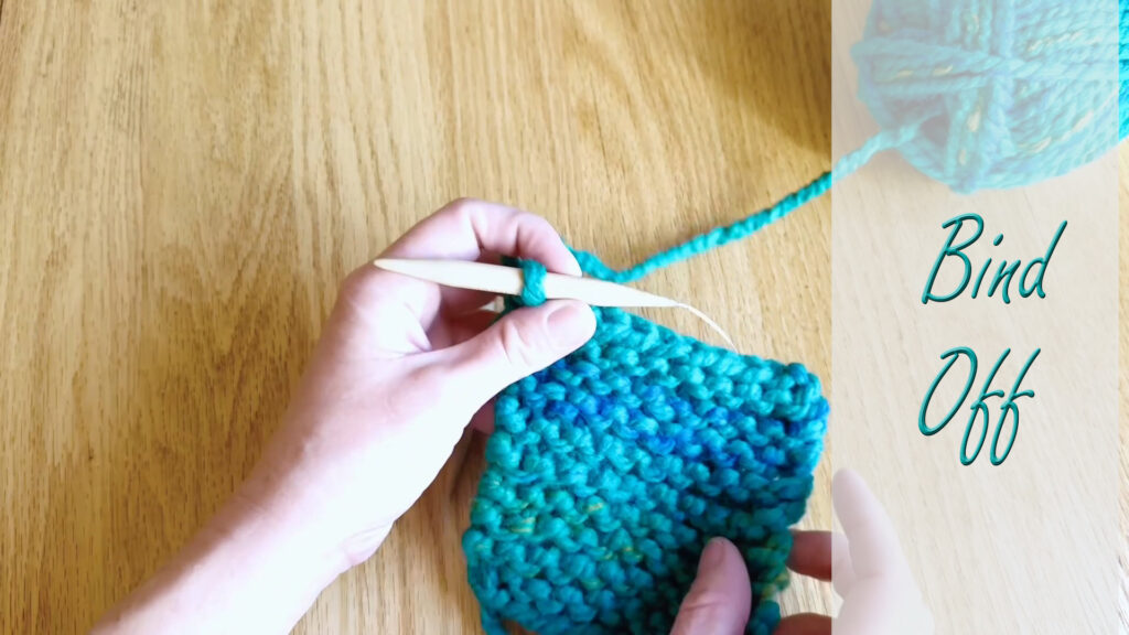 Knitted fabric on circular needles showing stitches ready to be bound off in the next lesson.