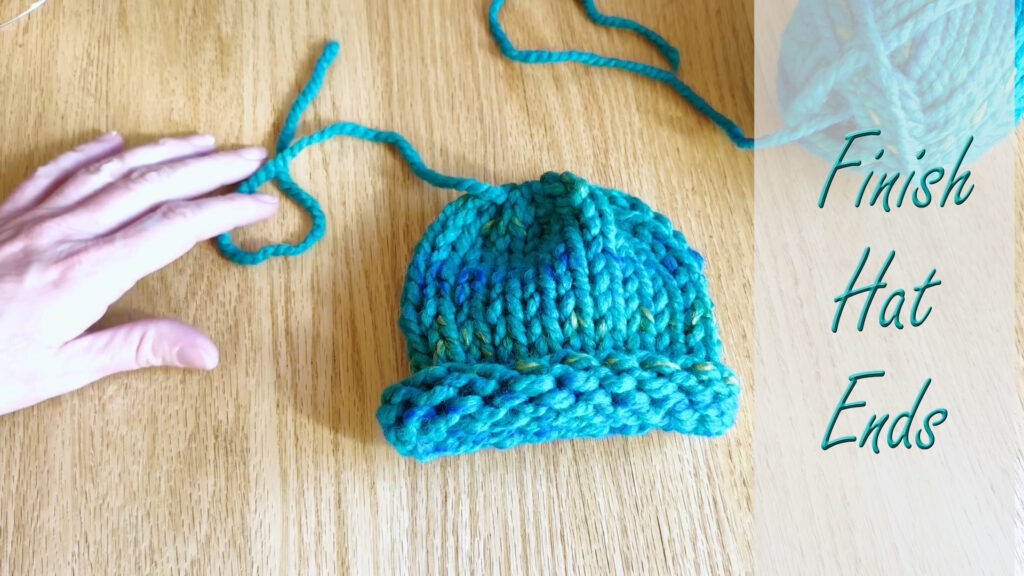 Kids' Knitting Guide – weaving in loose ends to finish a knitted hat.